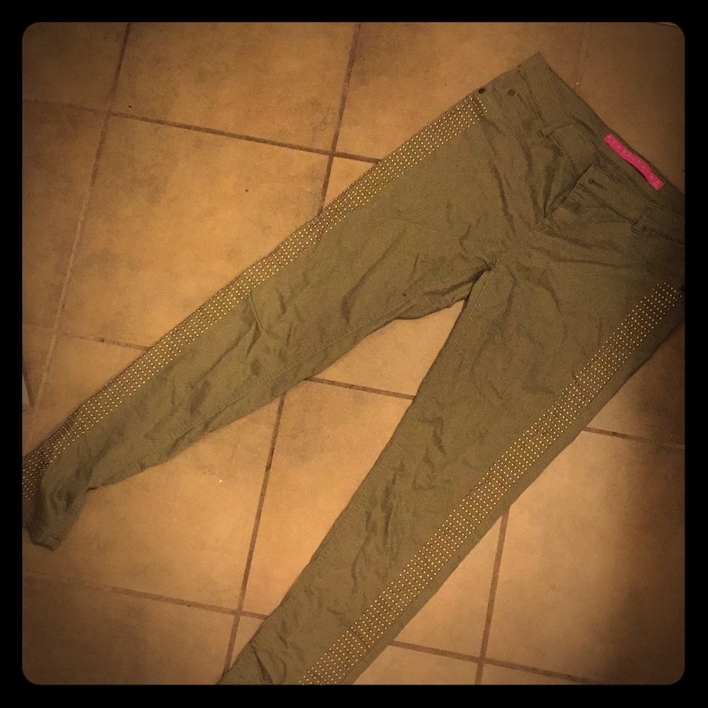 army green studded skinny jeans